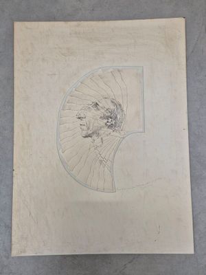 une image représentant le dessin d'une tête d'homme sur une feuille de papier