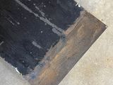 a close up of a piece of wood on the ground