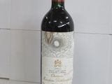 a bottle of wine that is sitting on a counter