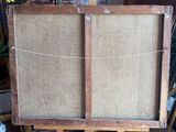 a picture of an old wooden easel with a burlock on it