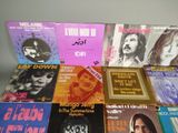 many different types of music cds on the table