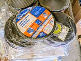 a pile of sanded discs sitting on top of a box