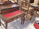 a table and chairs in a room with a lot of furniture