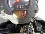 a close up of a speedometer on a motorcycle