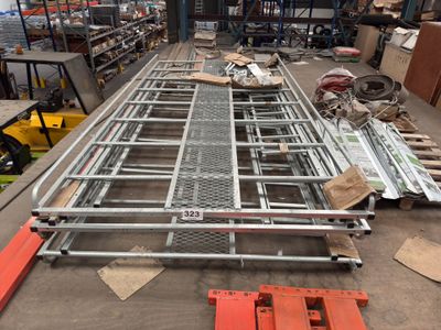 a large metal structure in the middle of a warehouse