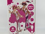 an image of a box with a picture of a girl in a pink outfit