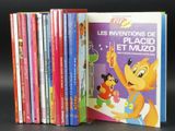 a lot of children ' s books that are on the table