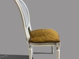 an image of a white chair with a brown cushion on it