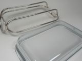two glass trays sitting next to each other on a table