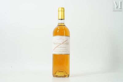 a bottle of wine that is sitting on a table