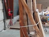 several pieces of wood stacked on top of each other in a warehouse