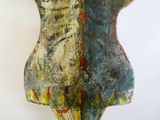 a sculpture of a woman ' s torso made of wood