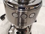 an image of a coffee maker on a white surface