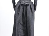 an image of a woman ' s black dress on a mannequin mannequin