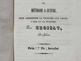 an open book with a black and white title on it