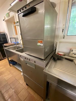 an image of a commercial kitchen with stainless steel appliances