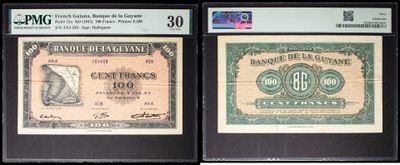 three different types of currency are on display in a display case