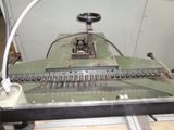 an image of a machine that is working on a piece of paper