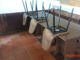 four wifi routers sitting on a table in a restaurant