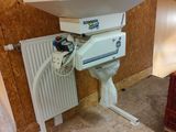 une image représentant une pièce équipée d'un chauffage et d'un radiateur