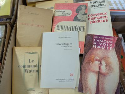 a lot of books that are sitting in a box