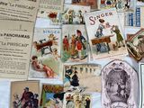 many different types of postcards on the table