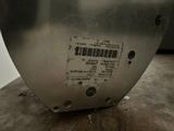 a close up of a piece of metal with a barcode on it