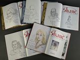 several pages of a book with a drawing of a woman and a man