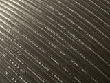 a close up of a large black object on a table