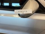 a sticker that says vaauto on the side mirror of a car