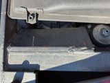 a close up view of a car ' s engine compartment