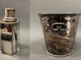 two different pictures of a silver vase with a cat on it