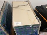 several boxes of mattresses are stacked on top of each other in a room