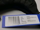 a blue tag on the back of a black jacket