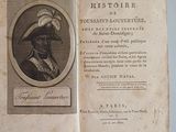un vieux livre sur lequel figure l'image d'un homme portant un turban