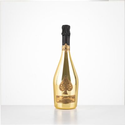 a bottle of champagne sitting on top of a table