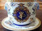 a cup and saucer sitting on a table