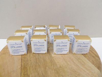 six boxes of chocolate milk sitting on top of a wooden cutting board