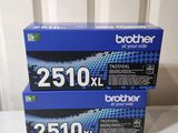 two brother toner cartridges sitting on top of each other on a table