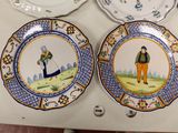 three plates with different designs on them on a table