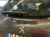 a car that has a sticker on the back of it