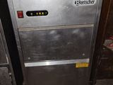 a picture of a kitchen appliance that is sitting in a room