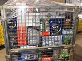 a cart full of cans and cans of beer in a warehouse