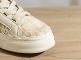 a close up of a pair of shoes on a table