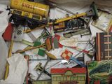 a box full of toy trains and other toys