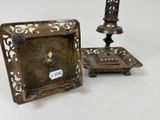 pair of antique brass candlesticks and trays with ornate design