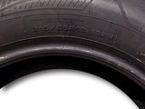 an image of a close up of a tire on a white background
