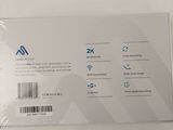 the back of a white box with a picture of a person holding it
