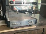 a coffee machine sitting on a counter in a kitchen
