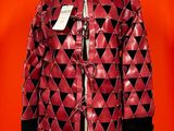 an image of a red jacket with black triangles on it